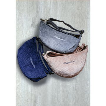 vier verschiedenfarbige Cordtaschen